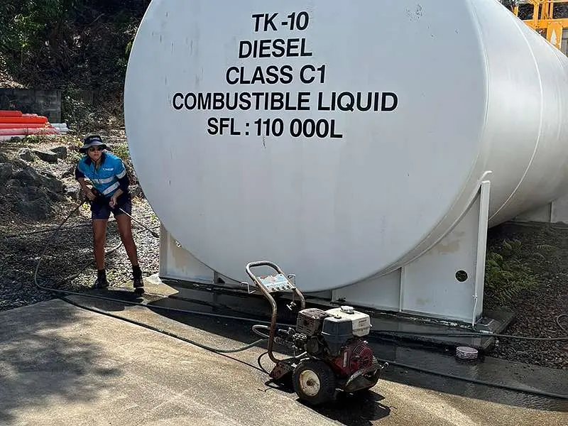 Fuel tank being power washed in preparation of NanoPrep application