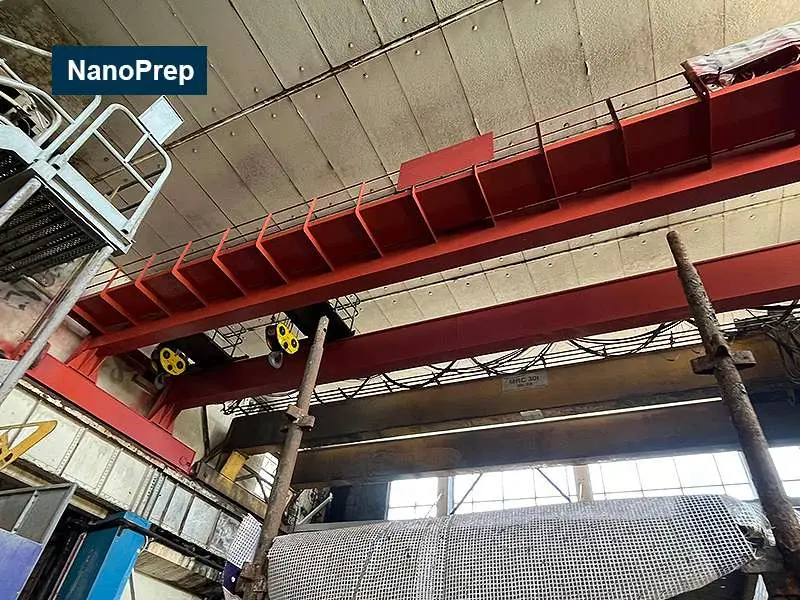 NanoPrep applied to crane via airless spray gun after high pressure wash