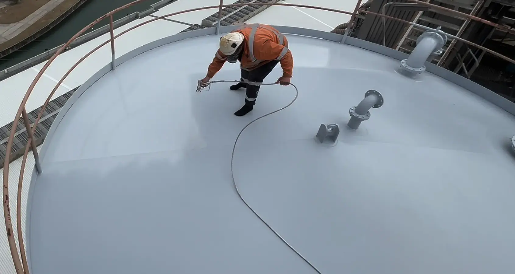 R230 TopCoat applied to the roof of a large storage tank