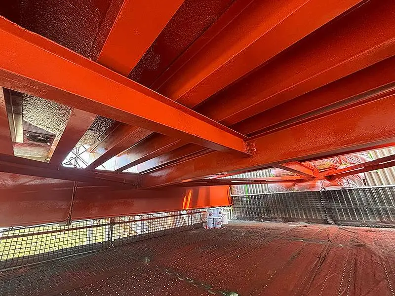 Water tank steel supports and underside repaired and coated for corrosion protection