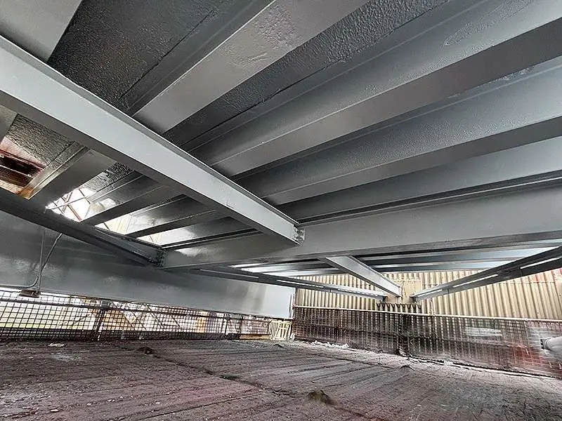 Water tank steel supports and underside repaired and coated with R230 TopCoat